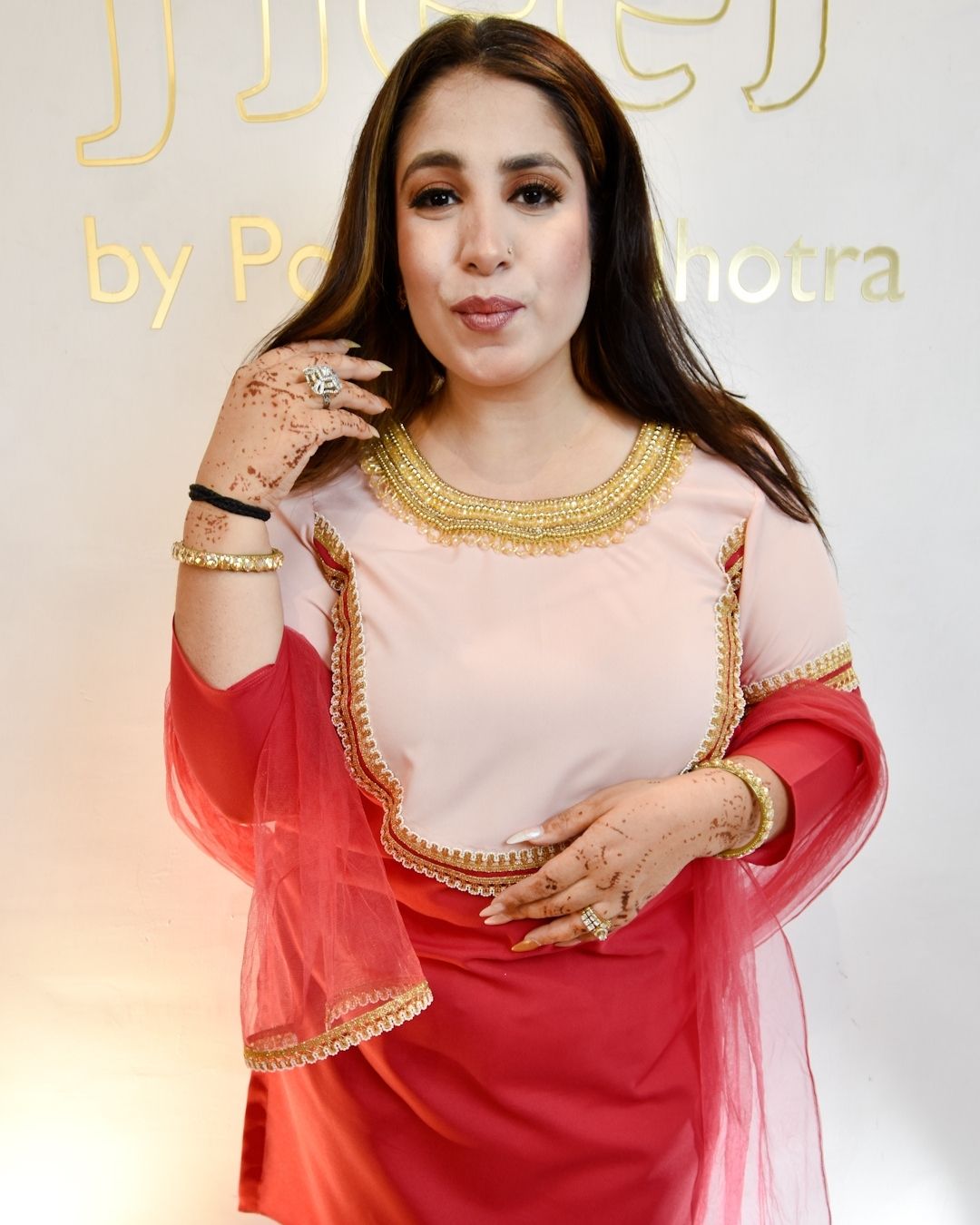 Peach and red suit with net dupatta