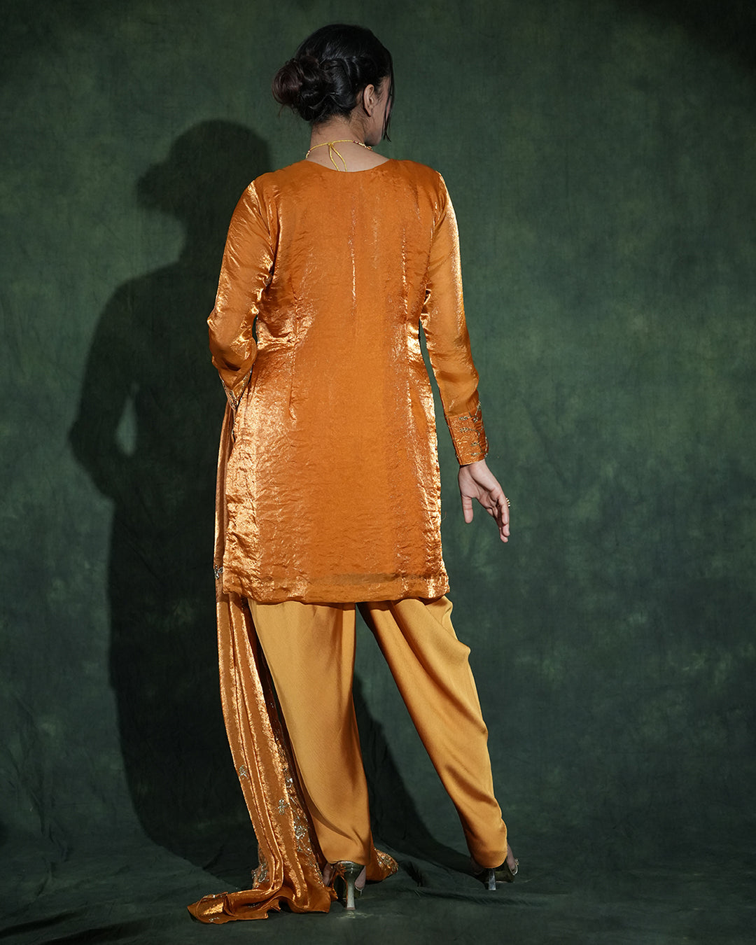 Mustard embellished designer suit elegant back view women