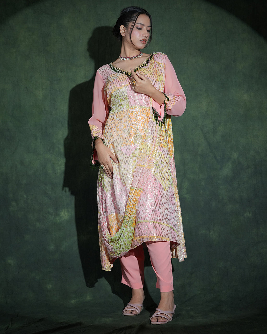 Pastel pink embellished suit elegant front view women