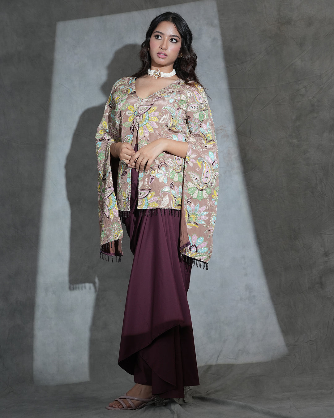 Maroon draped ensemble with floral embroidered cape