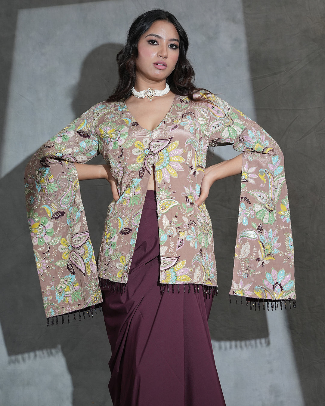 Floral embroidery and tassel detailing on designer ethnic outfit