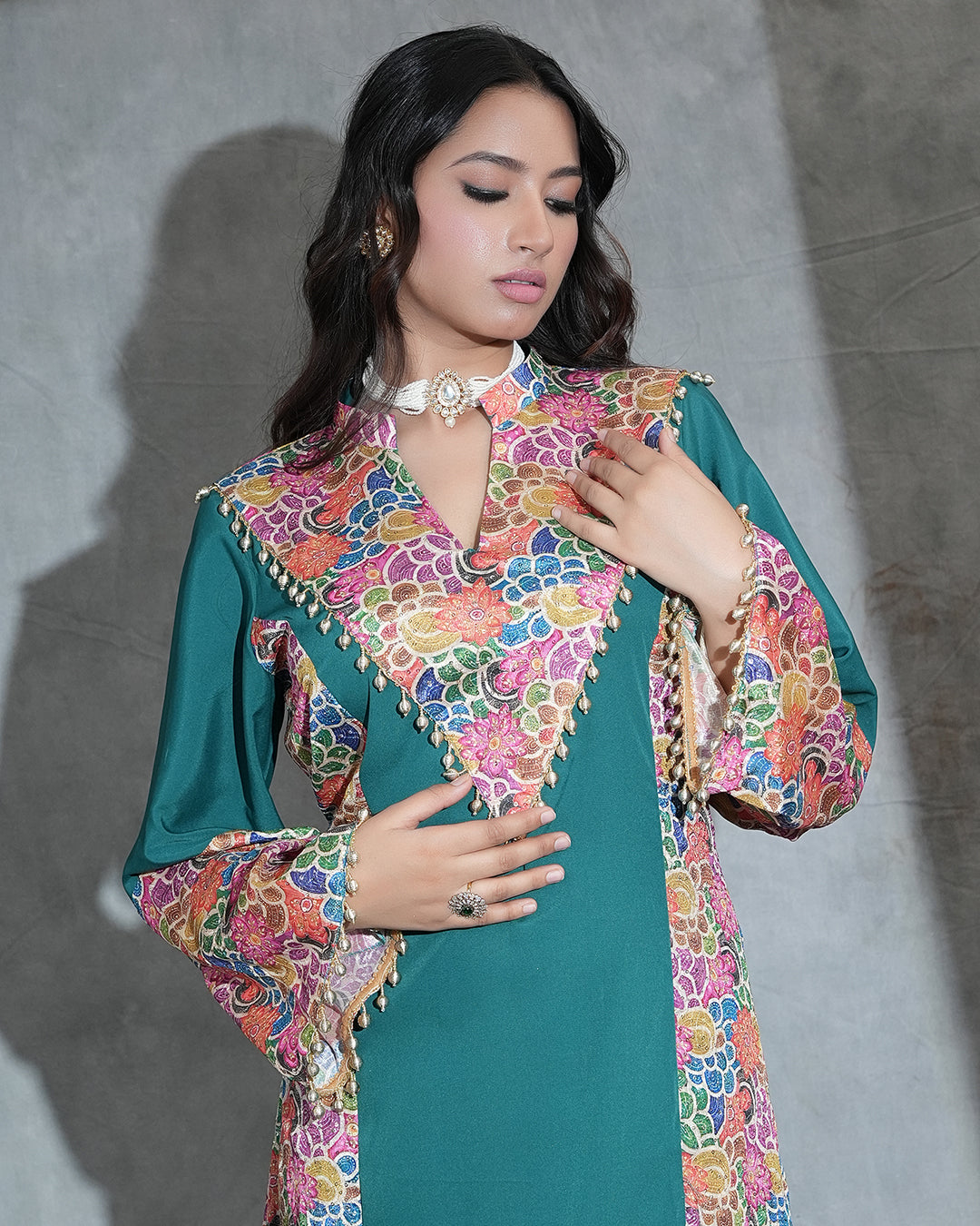 Multicolour floral embroidered neckline and cuffs on teal kurta