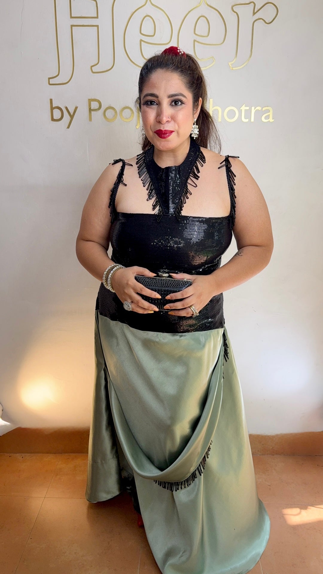 Black sequence sage green drape gown